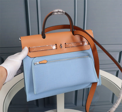 HM HERBAG ZIP 31 SKY AND BRONZE CANVAS