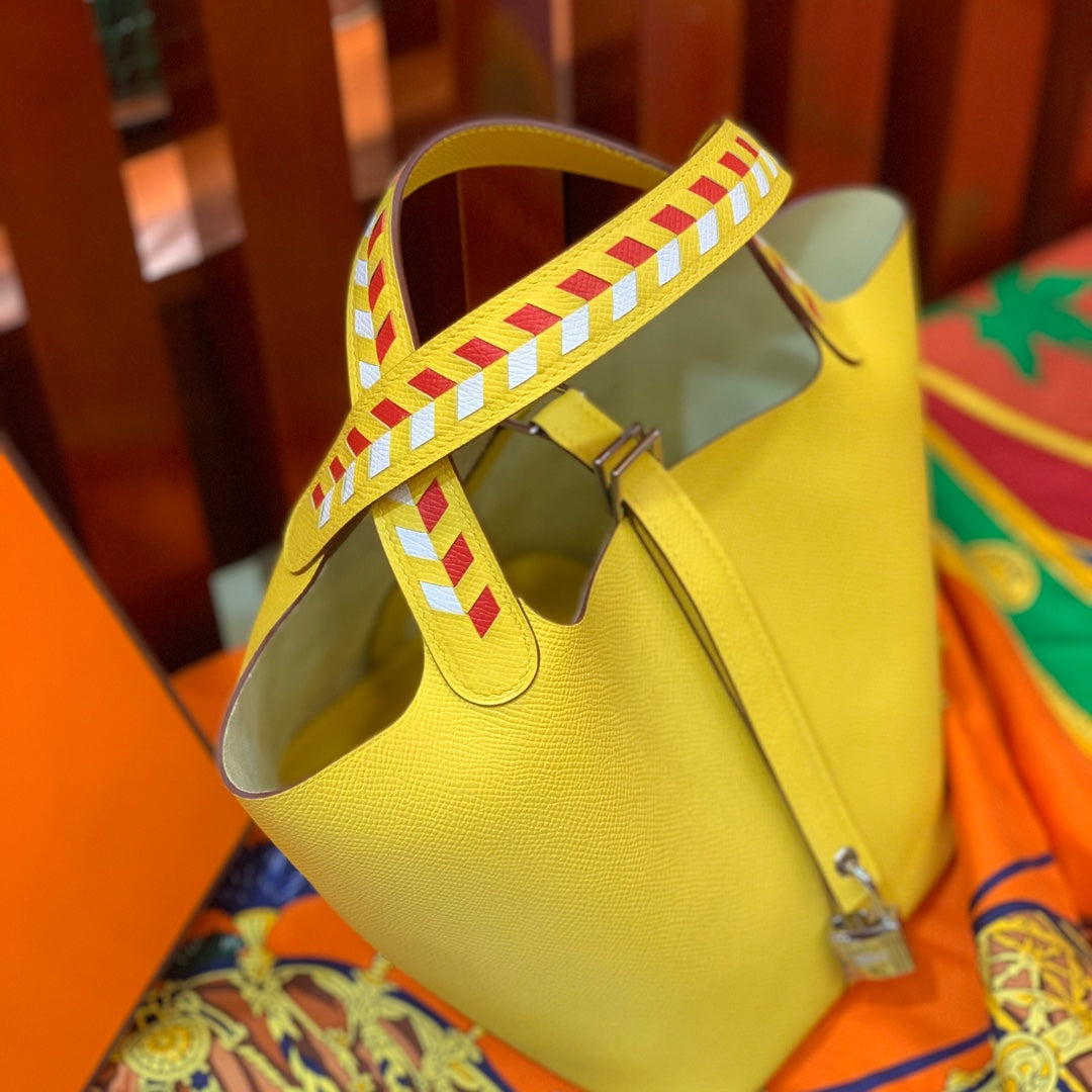 HM PICOTIN LOCK 18 LEMON EPSOM WITH BRAID STRAP