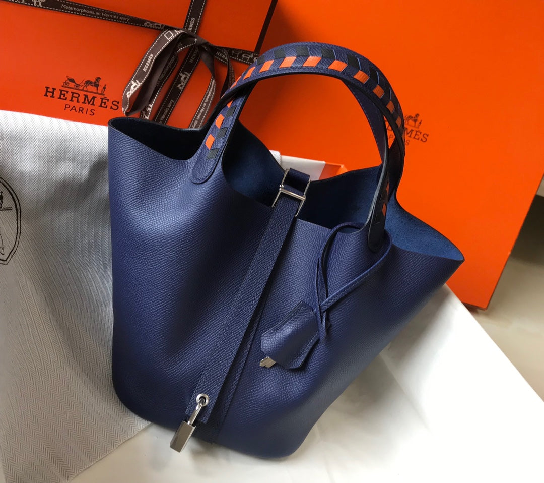 HM PICOTIN LOCK 18 NAVY EPSOM WITH BRAID STRAP
