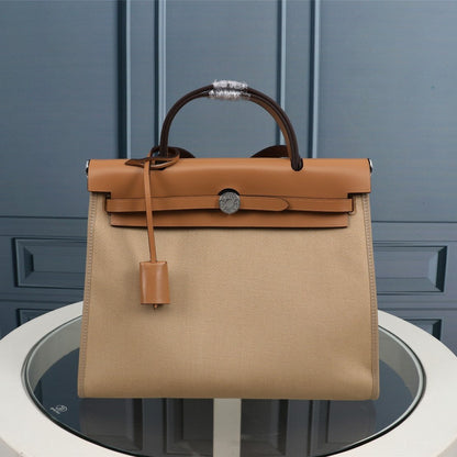 HM HERBAG ZIP 31 KHAKI AND BRONZE CANVAS