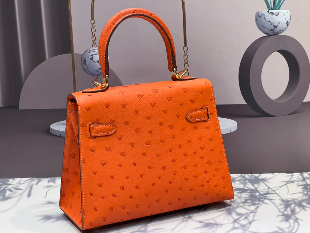 KELLY BAG 20 IN FIRE ORANGE OSTRICH LEATHER WITH GOLD HARDWARE (MADE - TO - ODER)