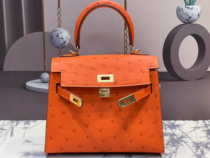 KELLY BAG 20 IN FIRE ORANGE OSTRICH LEATHER WITH GOLD HARDWARE (MADE - TO - ODER)