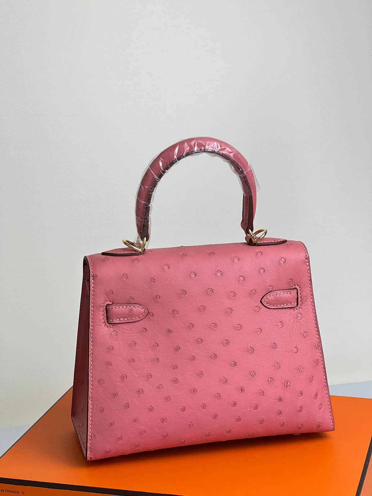 KELLY BAG 20 IN ROUGE PINK OSTRICH LEATHER WITH GOLD HARDWARE (MADE - TO - ODER)