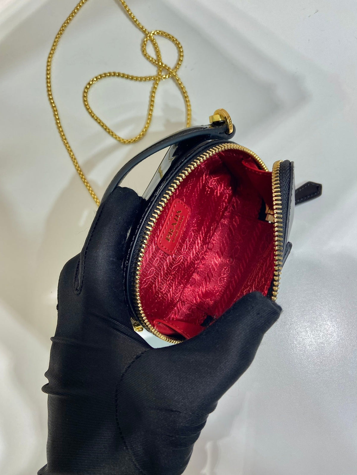 MINI HAND BAG 11 WITH GOLD STRAP IN BLACK PATENT CALFSKIN