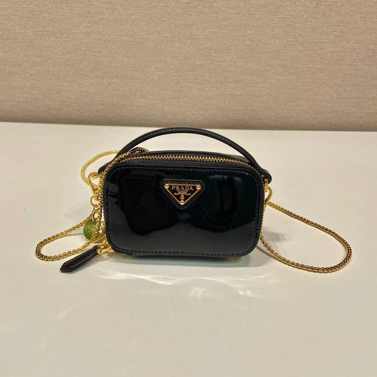MINI HAND BAG 11 WITH GOLD STRAP IN BLACK PATENT CALFSKIN