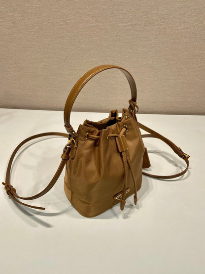 BUCKET BAG 19 IN RUSSET BROWN RE-NYLON AND CALFSKIN HANDLE