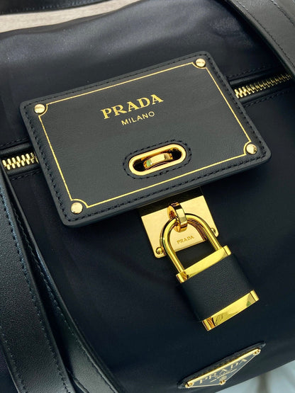 TRAVEL BAG 40 IN BLACK WATERPROOF FABRIC GOLD PADLOCK